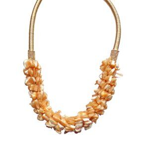 Beige color shell necklace with all shell chips in a thick cluster on gold cord